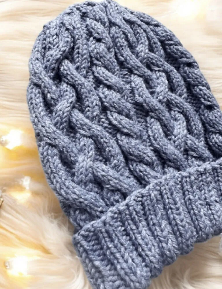 Blue Cable hand knit Beanie with Denim Effect.