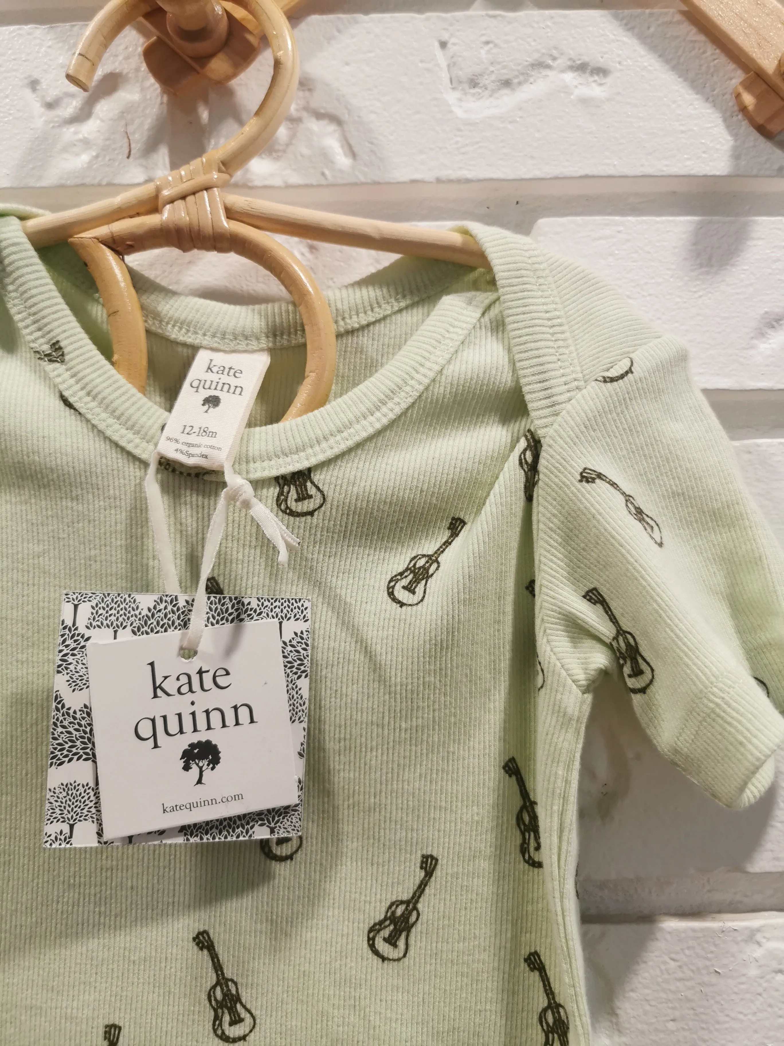 Kate Quinn Ribbed Cotton Bodysuit in Green Guitars (12-18)